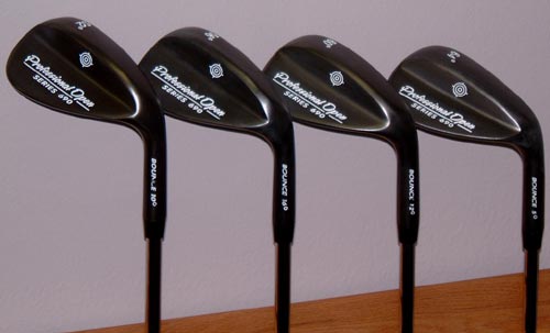 golf - Set of four wedges in lofts of 52, 56, 60 and 64. Black set of wedges. semi U groove