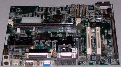 BCM DR737 Slot 1 motherboard. Intel 440BX chipset with 2 PCI, 1 ISA, 2 SDRAM slots. On-Board audio and video. Micro ATX form factor.