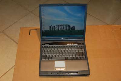 used laptop with Windows XP Pro, serial port and floppy drive