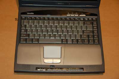 used laptop with Windows XP Pro, serial port and floppy drive